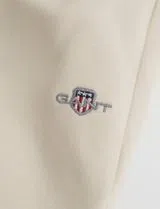 Pantalones Deportivos Shield Beige